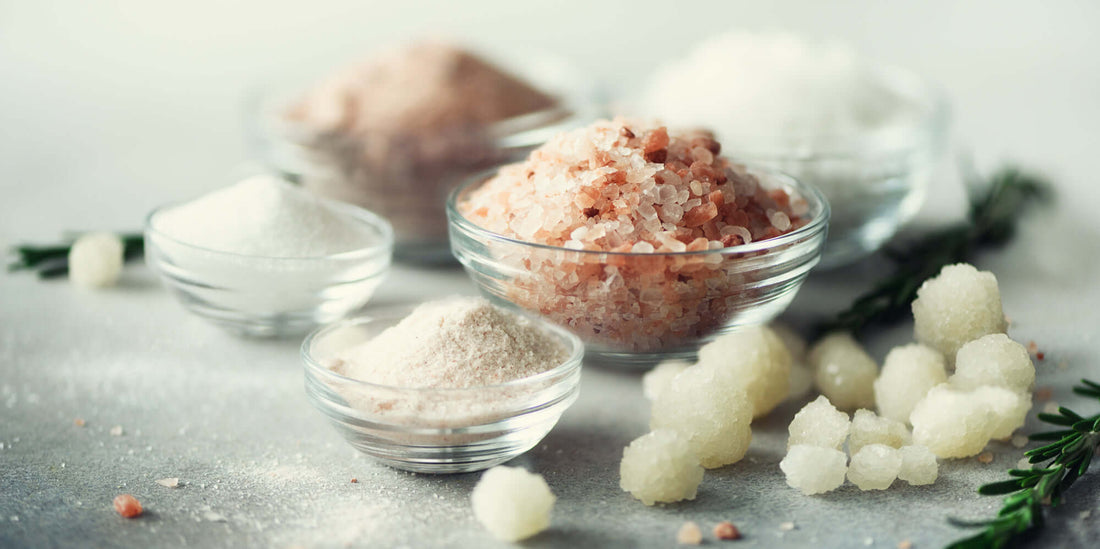 Sea Salt vs. Himalayan Salt: How Are They Different? Various types of salt in bowls, including Himalayan salt and sea salt.